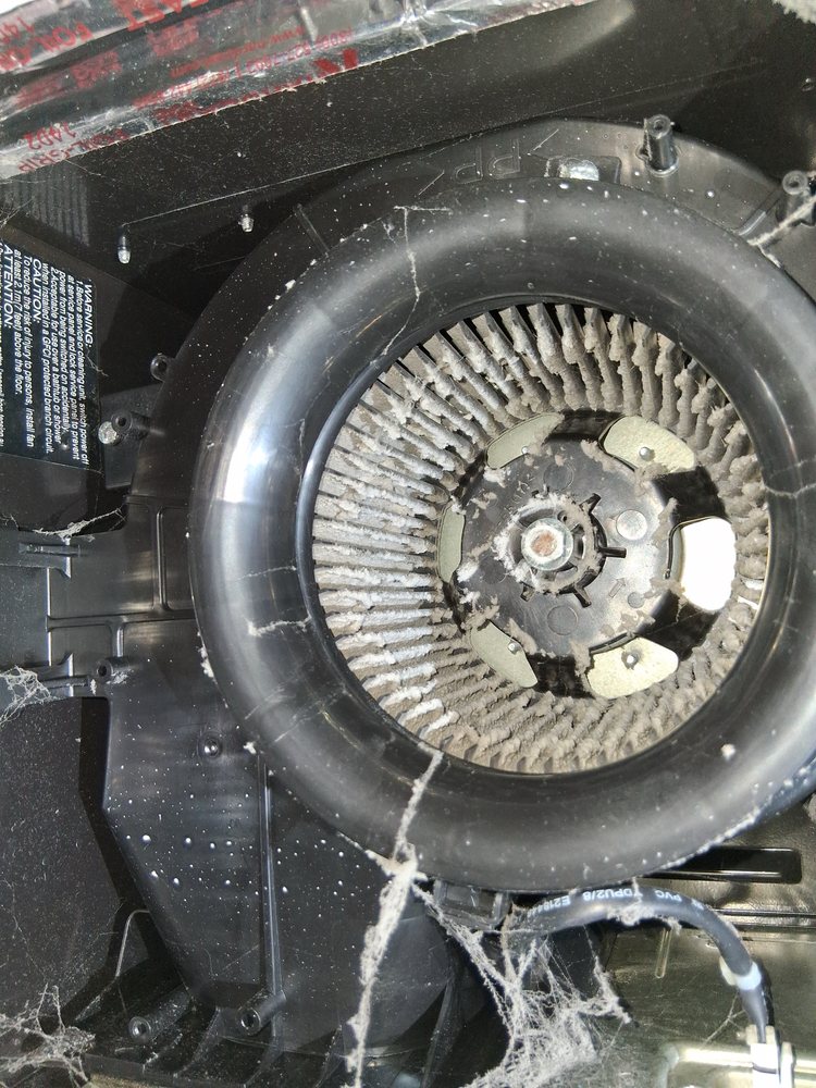 Dirty HVAC fan before professional air duct cleaning in Oakland, CA