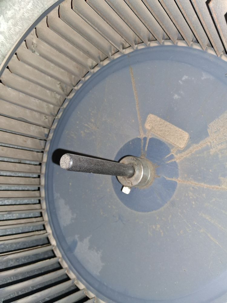 Blue HVAC blower fan cleaned for better airflow in Oakland, CA
